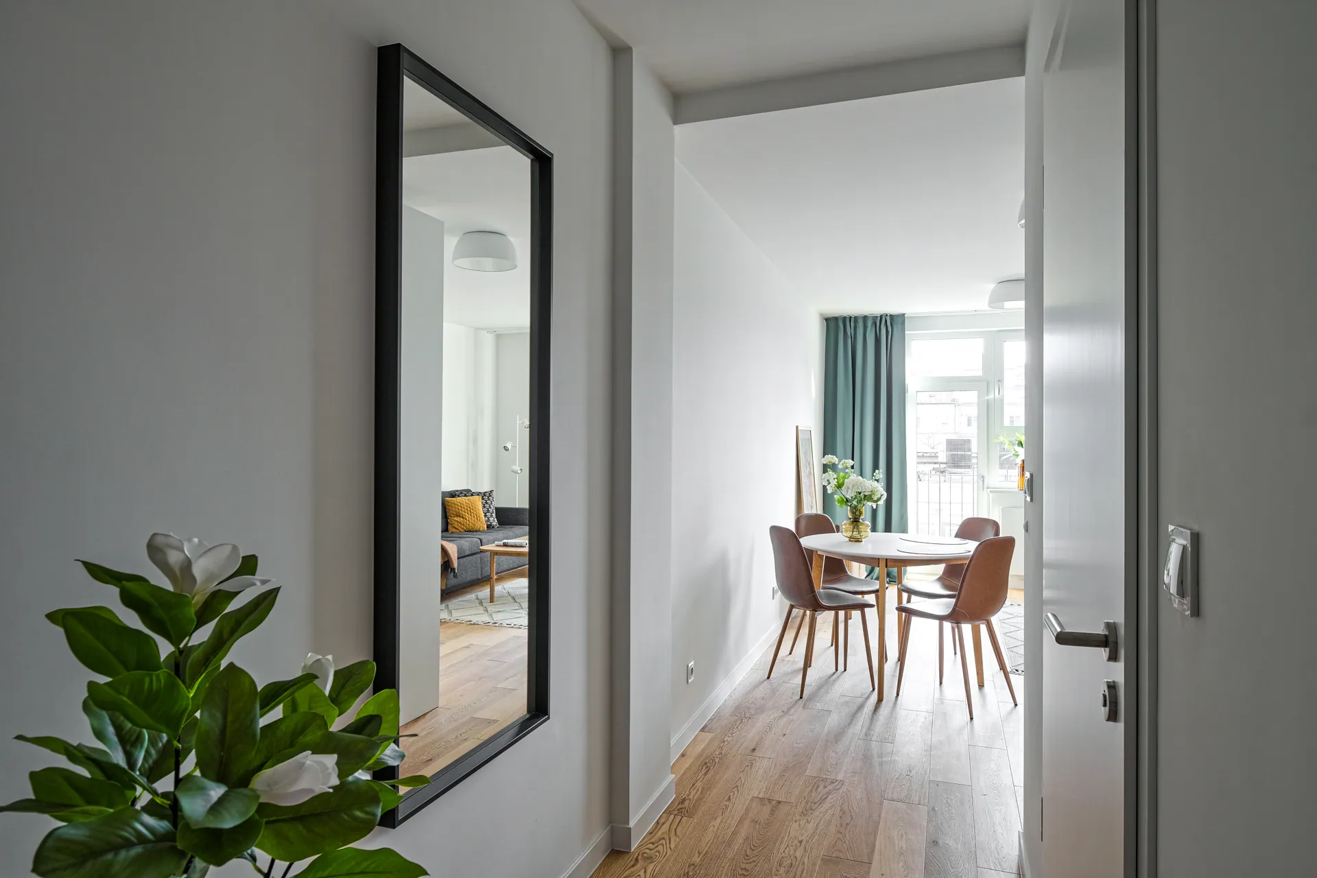 Build-to-rent apartment - dining table and living area, a MILO Group project